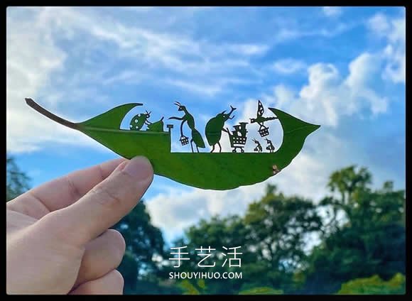 藝術(shù)家精心將復(fù)雜的場景雕刻在樹葉上 -  www.rpnrmr.com