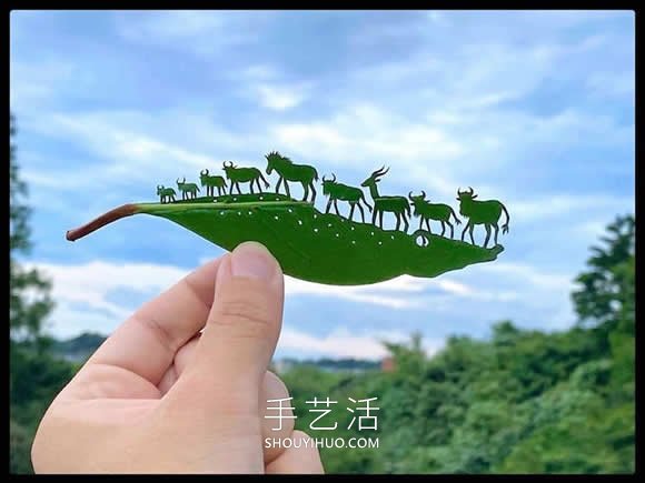 藝術(shù)家精心將復(fù)雜的場景雕刻在樹葉上 -  www.rpnrmr.com